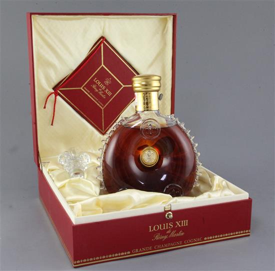 A boxed Louis XIII de Remy Martin Grande Champagne Cognac in a Baccarat Crystal decanter.